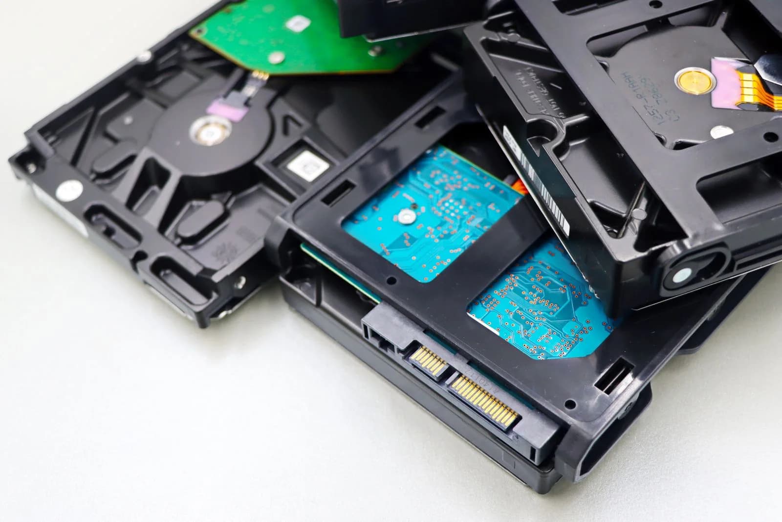 Hard disk drives showing their circuit boards and connectors